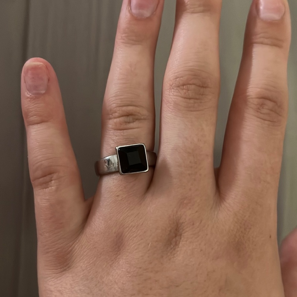 Size 9 silver ring with black stone
